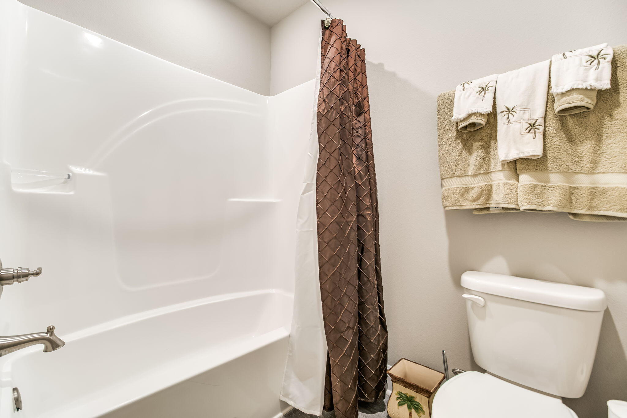 9188 Trident Road Milton, FL 32583 - Photo 26 of 47 a bathroom with a toilet and a shower