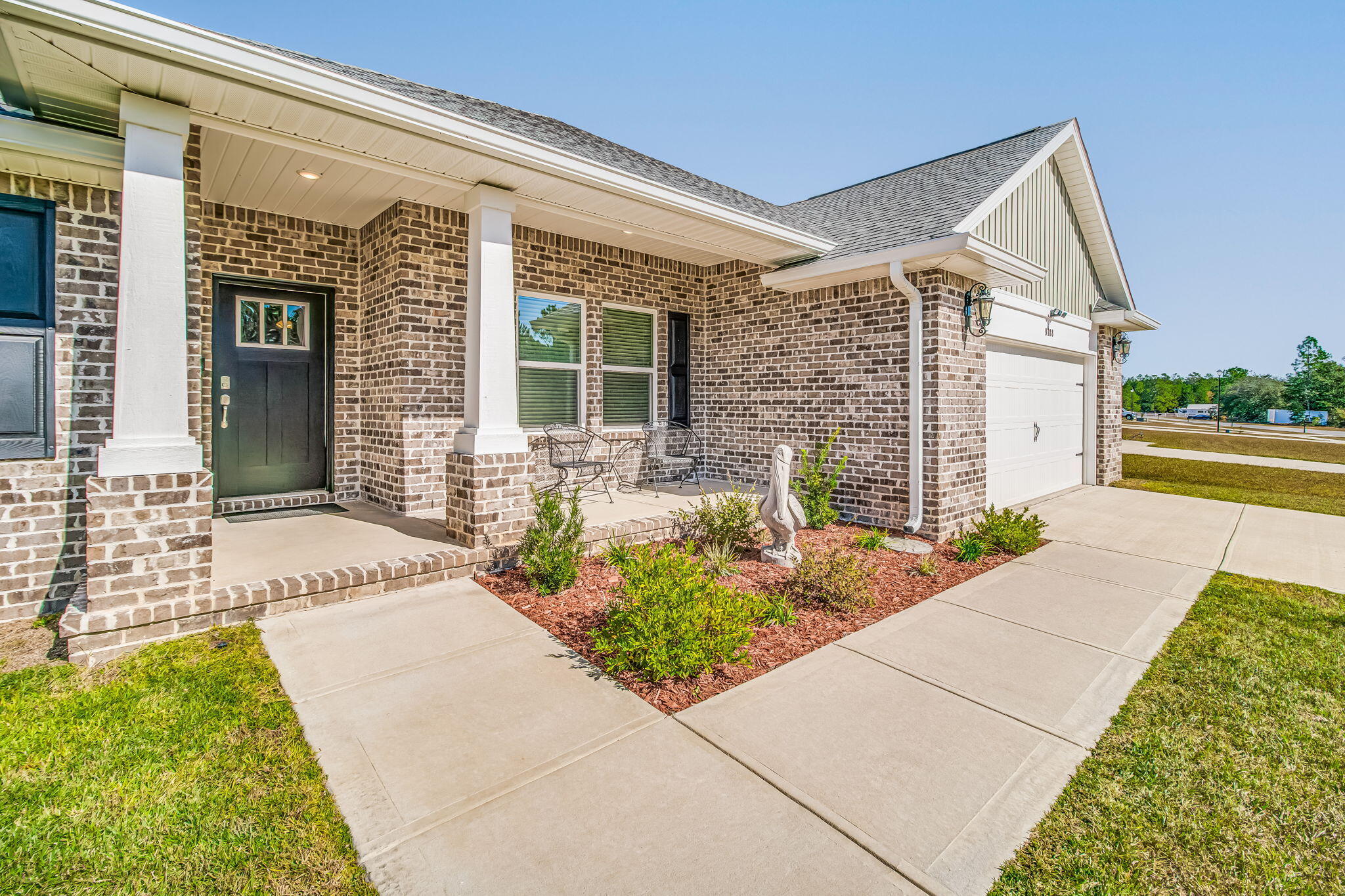 9188 Trident Road Milton, FL 32583 - Photo 3 of 47 a front view of a house