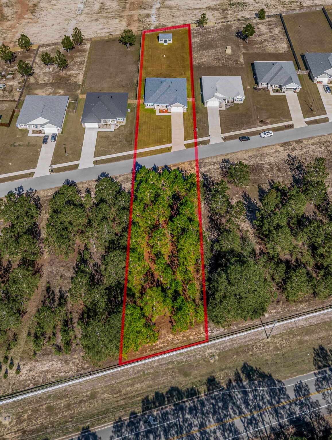 9188 Trident Road Milton, FL 32583 - Photo 43 of 47 an aerial view of a houses with street