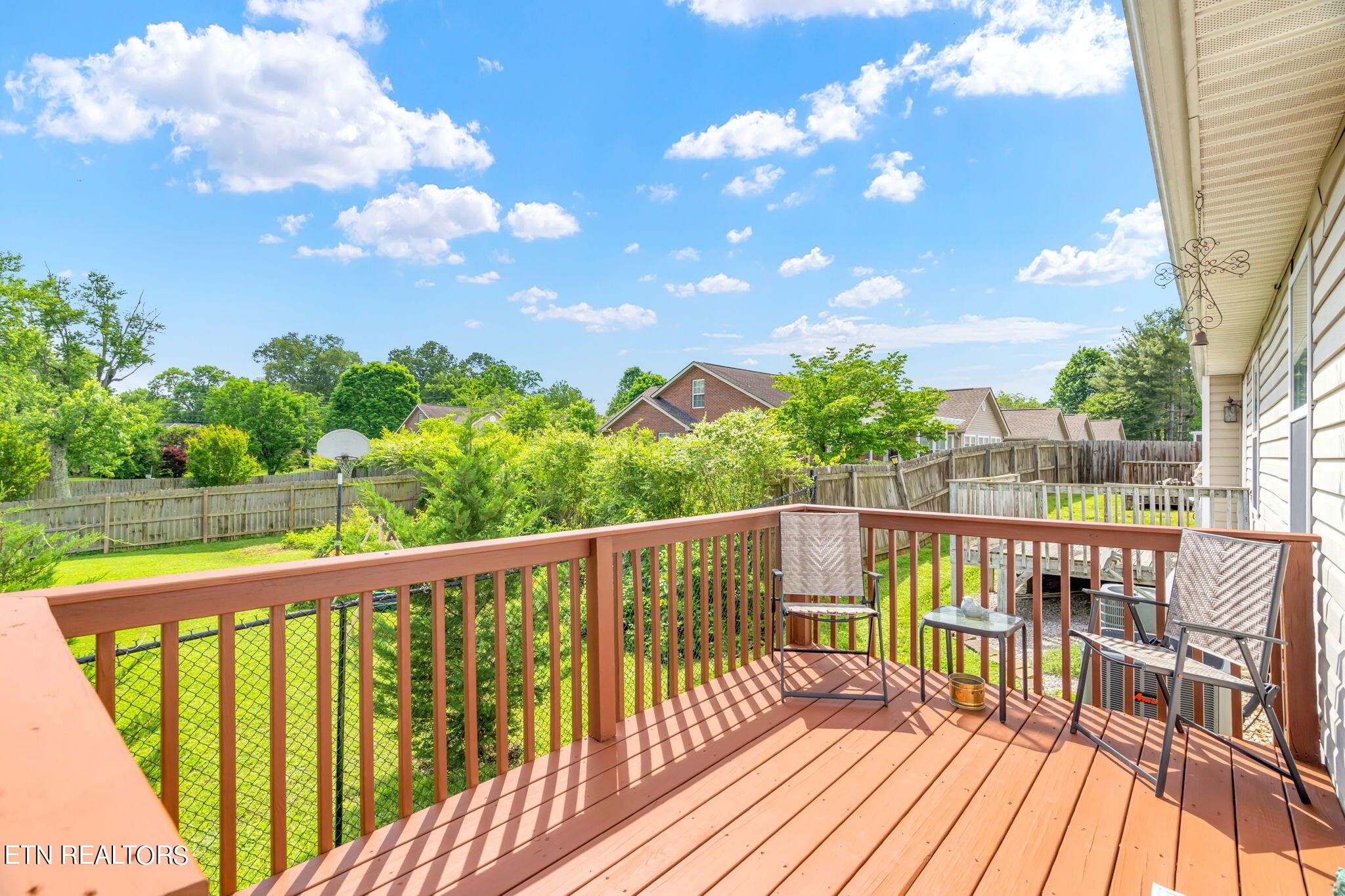 705 High Point Way, Knoxville, TN 37912 - Photo 19 of 22 a view of balcony with wooden floor and fence