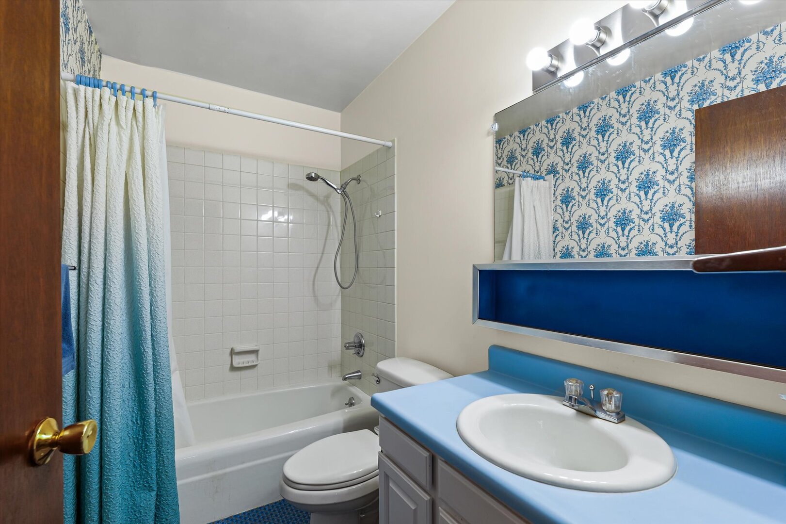 2307 Branch Road Champaign, IL 61821 - Photo 14 of 26 a bathroom with a sink a toilet and shower