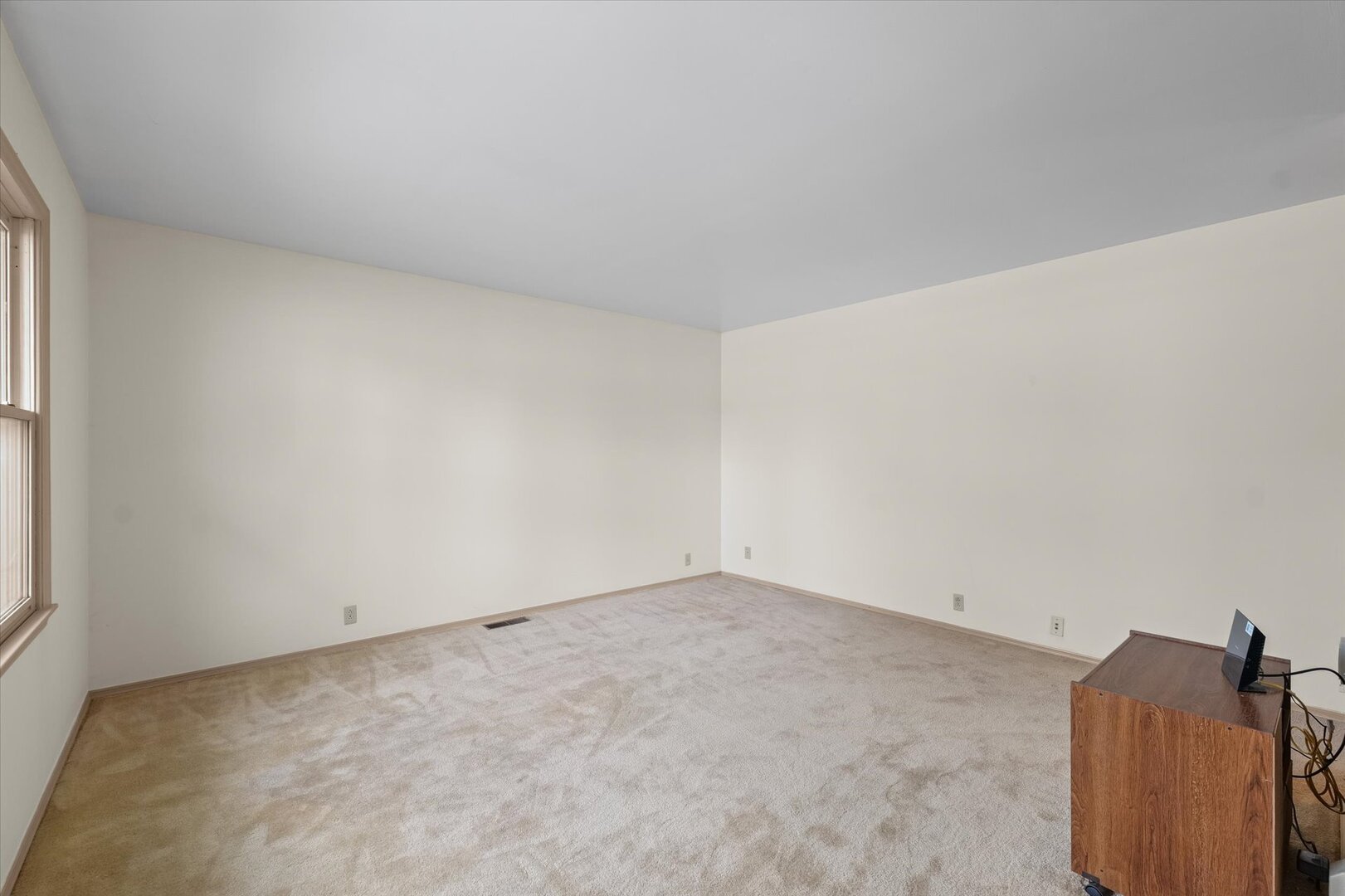 2307 Branch Road Champaign, IL 61821 - Photo 4 of 26 an empty room with windows