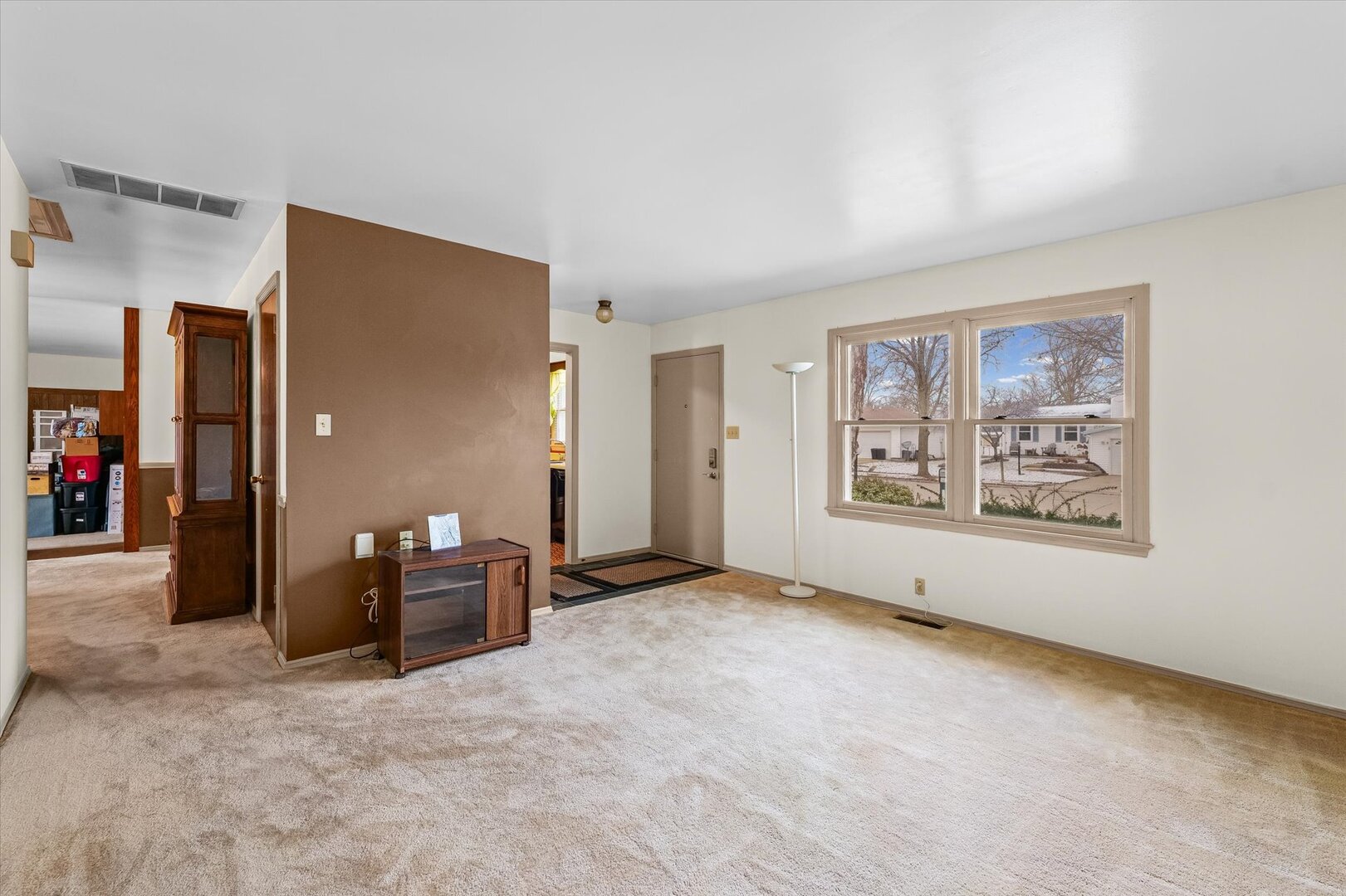 2307 Branch Road Champaign, IL 61821 - Photo 5 of 26 a view of a livingroom with workspace and a window