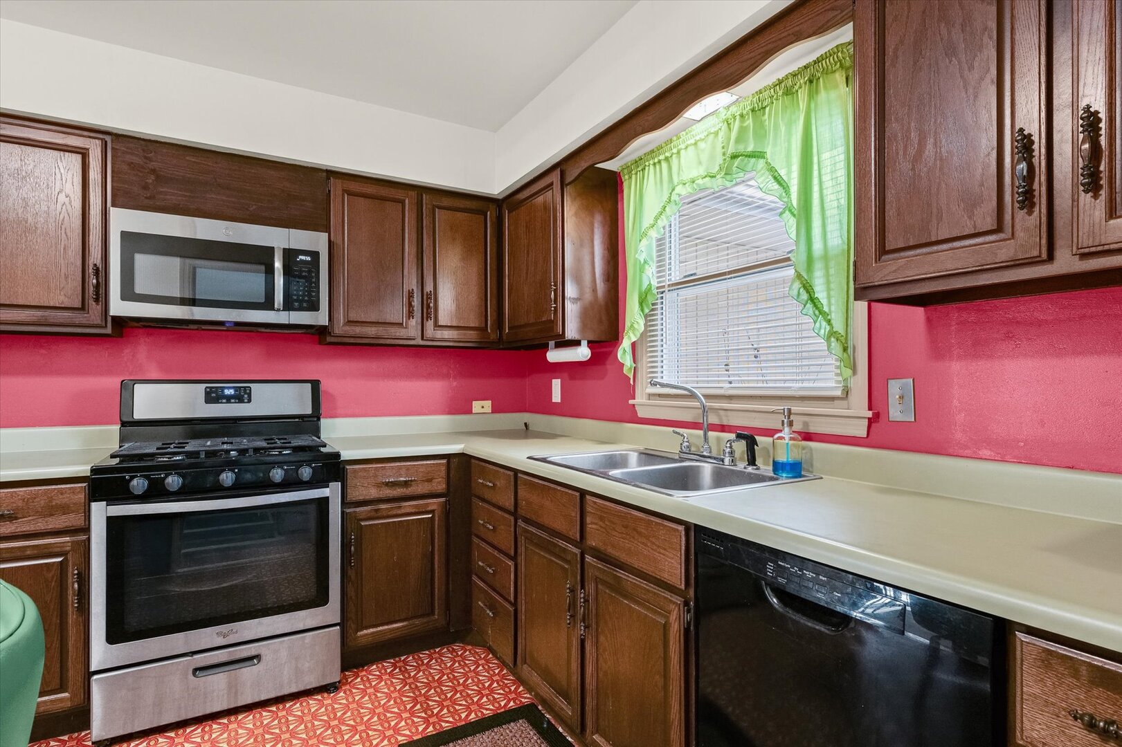 2307 Branch Road Champaign, IL 61821 - Photo 8 of 26 a kitchen with stainless steel appliances a stove sink and cabinets