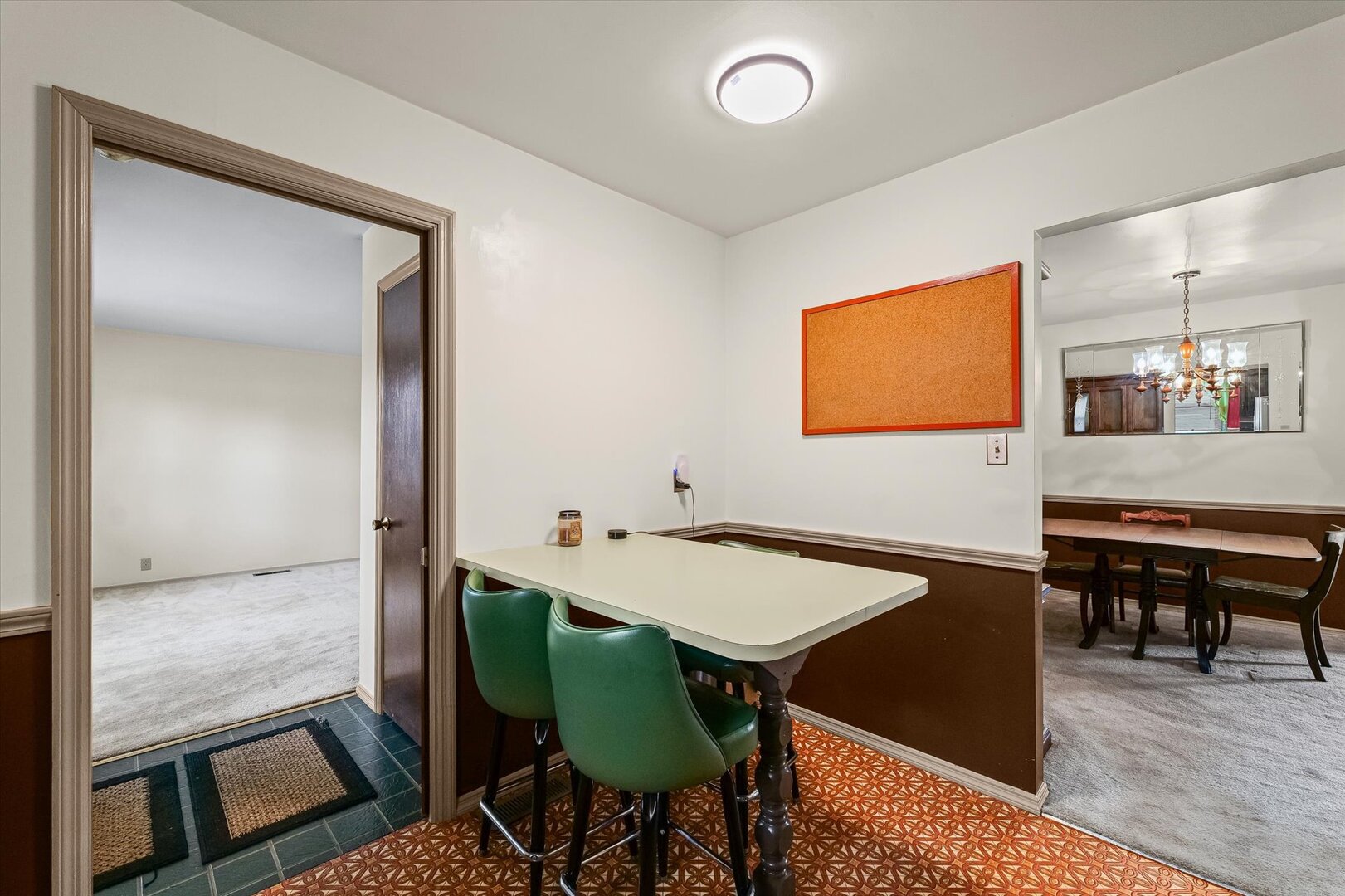 2307 Branch Road Champaign, IL 61821 - Photo 9 of 26 a view of a dining room with furniture and wooden floor