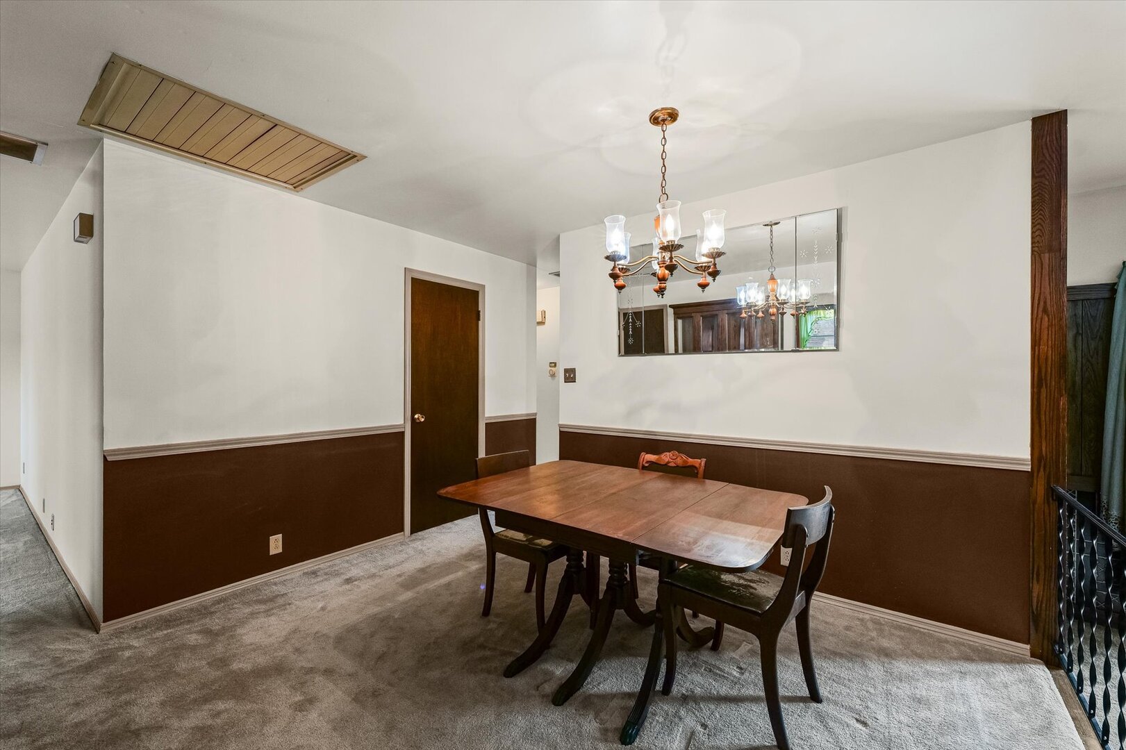 2307 Branch Road Champaign, IL 61821 - Photo 10 of 26 a view of a dining room with furniture and chandelier