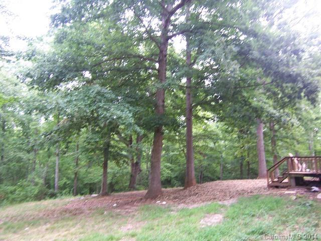 452 Lancaster Estate Road Fort Mill, SC 29707 - Photo 17 of 19 a backyard of a house with table and chairs