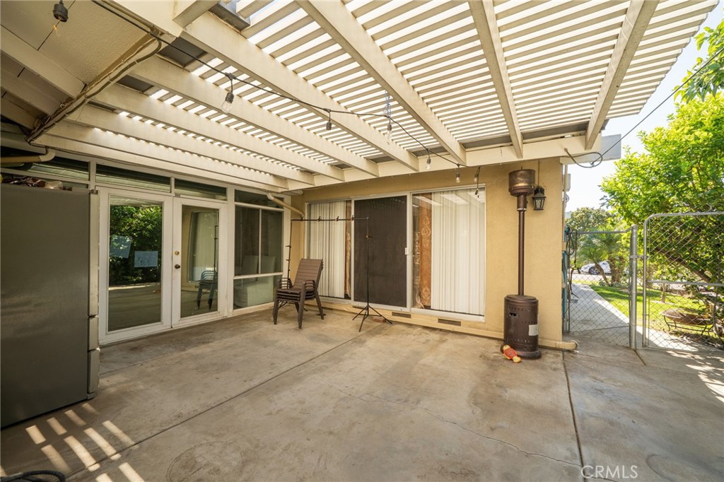 5035 Carlingford Avenue Riverside, CA 92504 - Photo 24 of 32 a view of a room with gym equipment and large windows