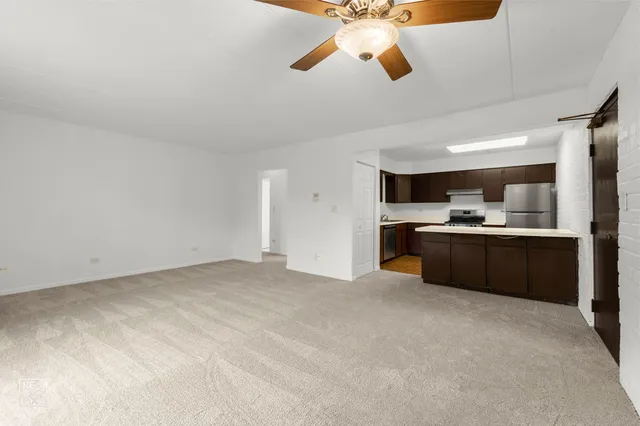 a view of kitchen and kitchen with a sink