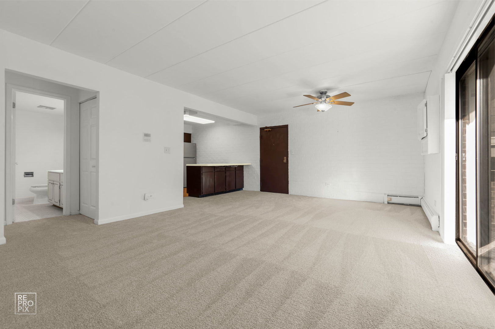 264 East Bailey Road, Unit E Naperville, IL 60565 - Photo 5 of 10 a view of an empty room with a window