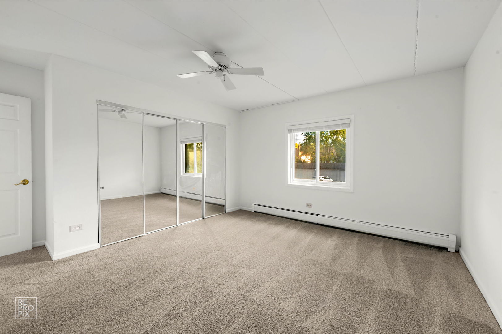 264 East Bailey Road, Unit E Naperville, IL 60565 - Photo 7 of 10 a view of an empty room with a window