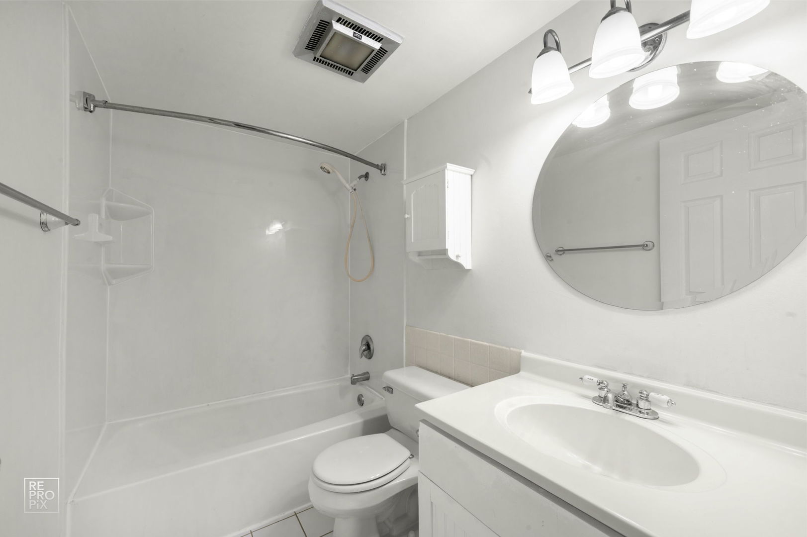 264 East Bailey Road, Unit E Naperville, IL 60565 - Photo 8 of 10 a bathroom with a sink toilet and shower