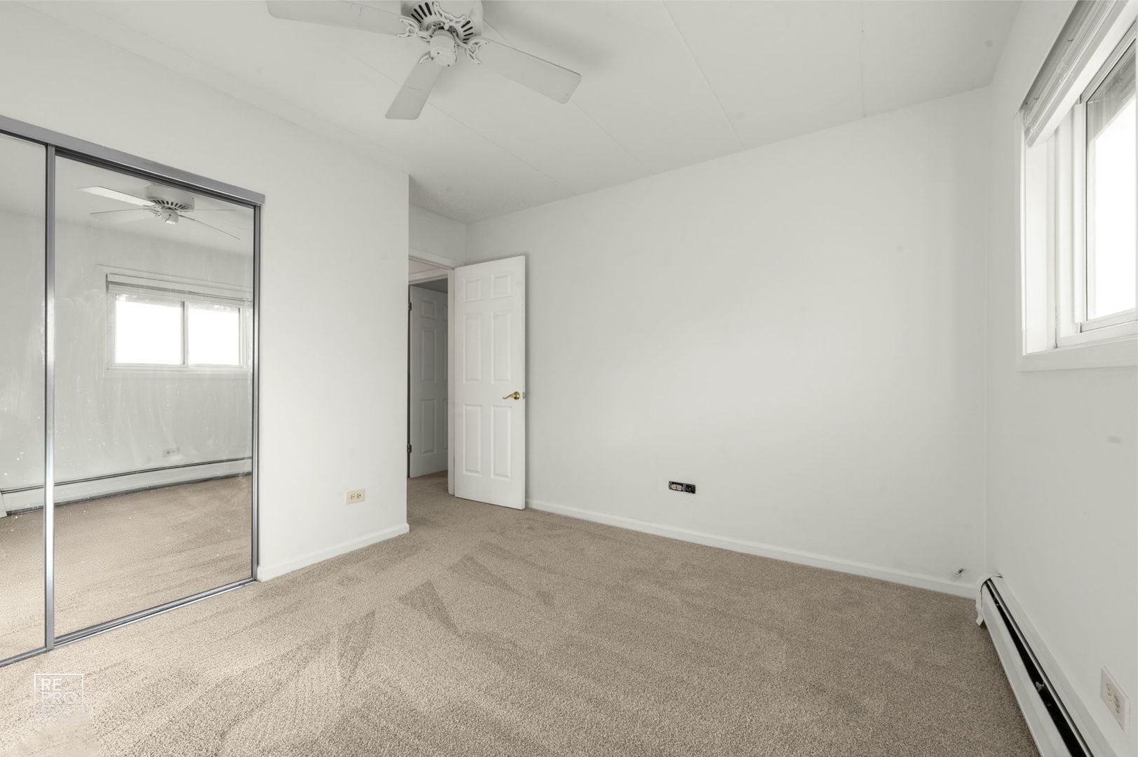 264 East Bailey Road, Unit E Naperville, IL 60565 - Photo 9 of 10 an empty room with window