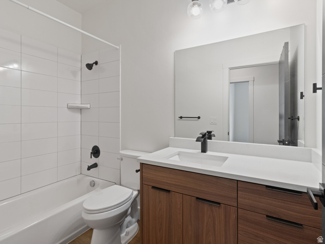 130 East 7085th South, Unit 3 Midvale, UT 84047 - Photo 11 of 30 Full bath featuring vanity and tub / shower combination