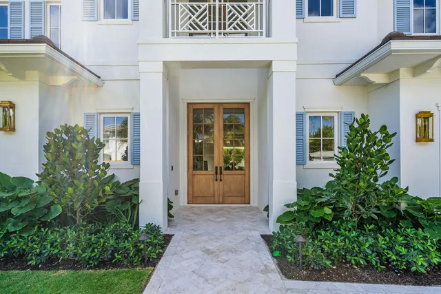a front view of a house with a porch