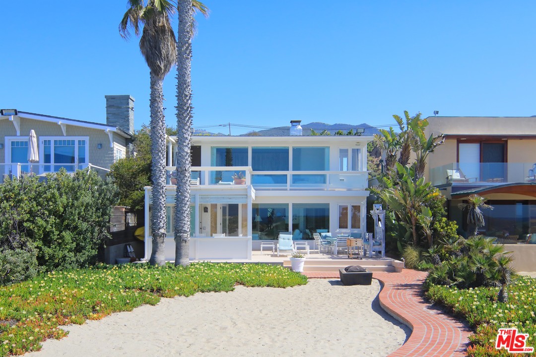31008 Broad Beach Road Malibu, CA 90265 - Photo 6 of 40 a front view of a house with yard and green space