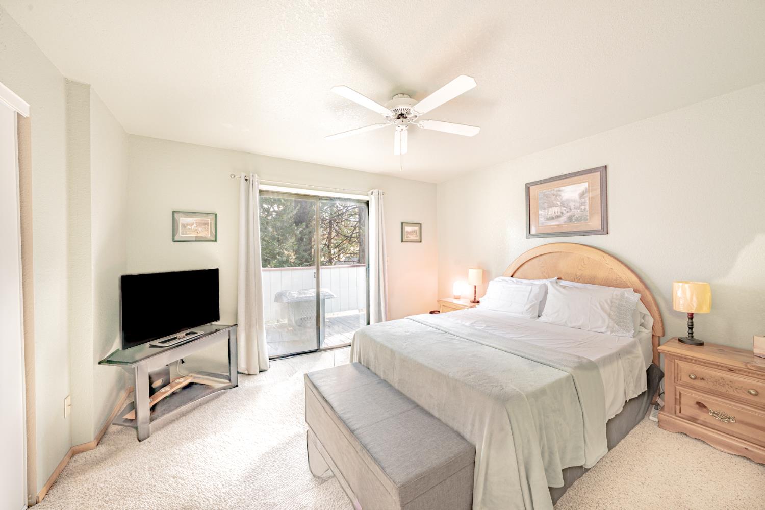 1002 Manuel Road Arnold, CA 95223 - Photo 11 of 34 a bedroom with a bed and a flat screen tv