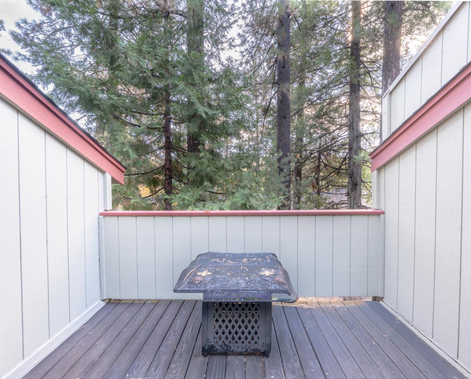 1002 Manuel Road Arnold, CA 95223 - Photo 13 of 34 a view of balcony with wooden floor and outdoor seating