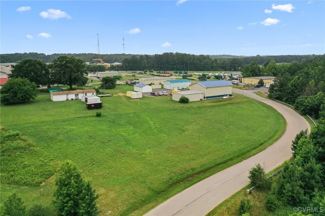 a view of a garden with houses