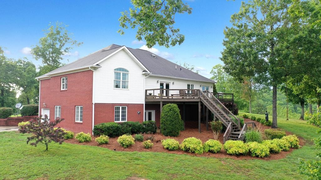 1797 Eads Bluff Road Northwest Georgetown, TN 37336 - Photo 5 of 61 a front view of a house with a yard
