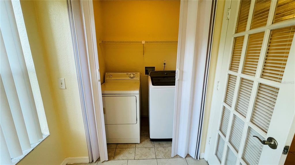 5120 Conroy Road, Unit 13 Orlando, FL 32811 - Photo 7 of 25 a view of a bathroom with a sink