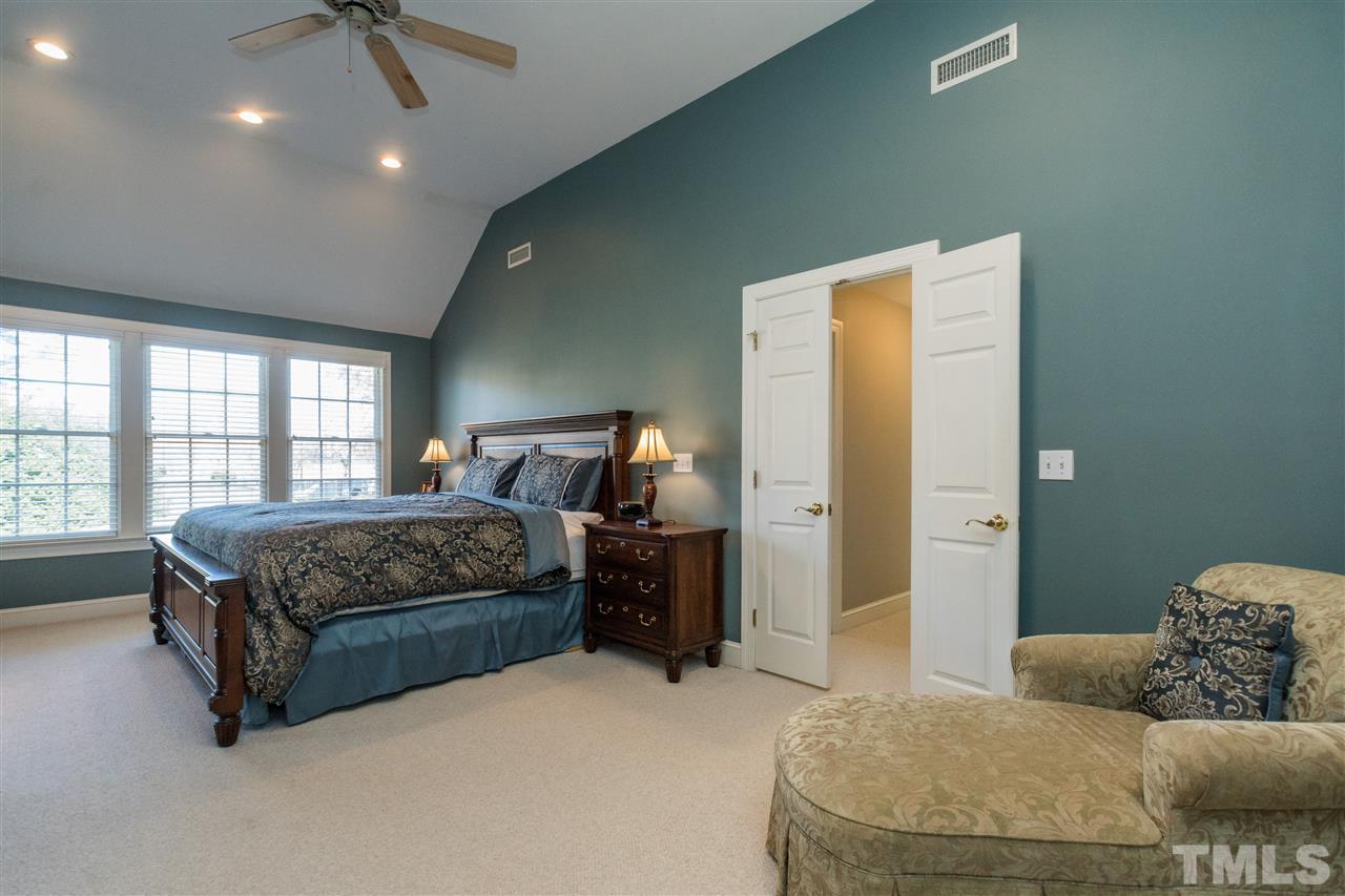 1000 Nortonbridge Road Raleigh, NC 27603 - Photo 17 of 30 a bedroom with a bed and a dresser