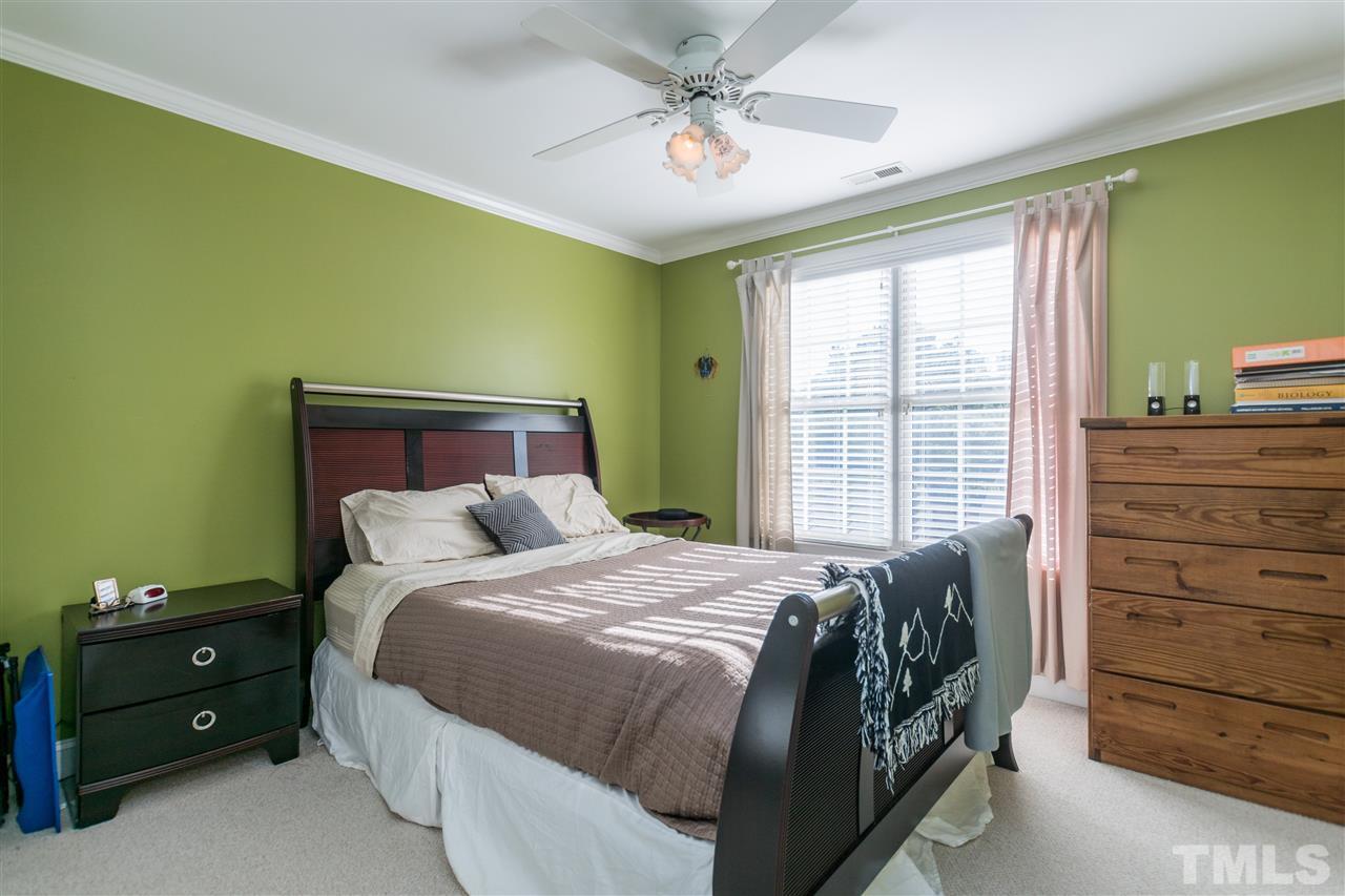 1000 Nortonbridge Road Raleigh, NC 27603 - Photo 22 of 30 a bedroom with a bed and a dresser