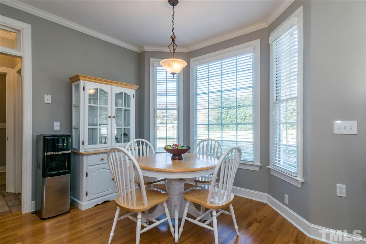 1000 Nortonbridge Road Raleigh, NC 27603 - Photo 7 of 30 a dining room with furniture window wooden floor
