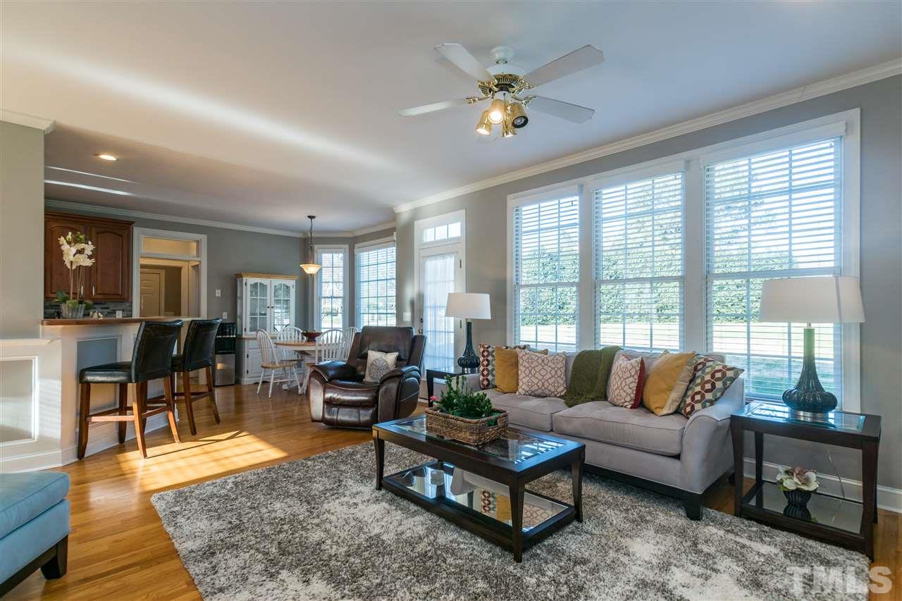 1000 Nortonbridge Road Raleigh, NC 27603 - Photo 8 of 30 a living room with furniture and a large window