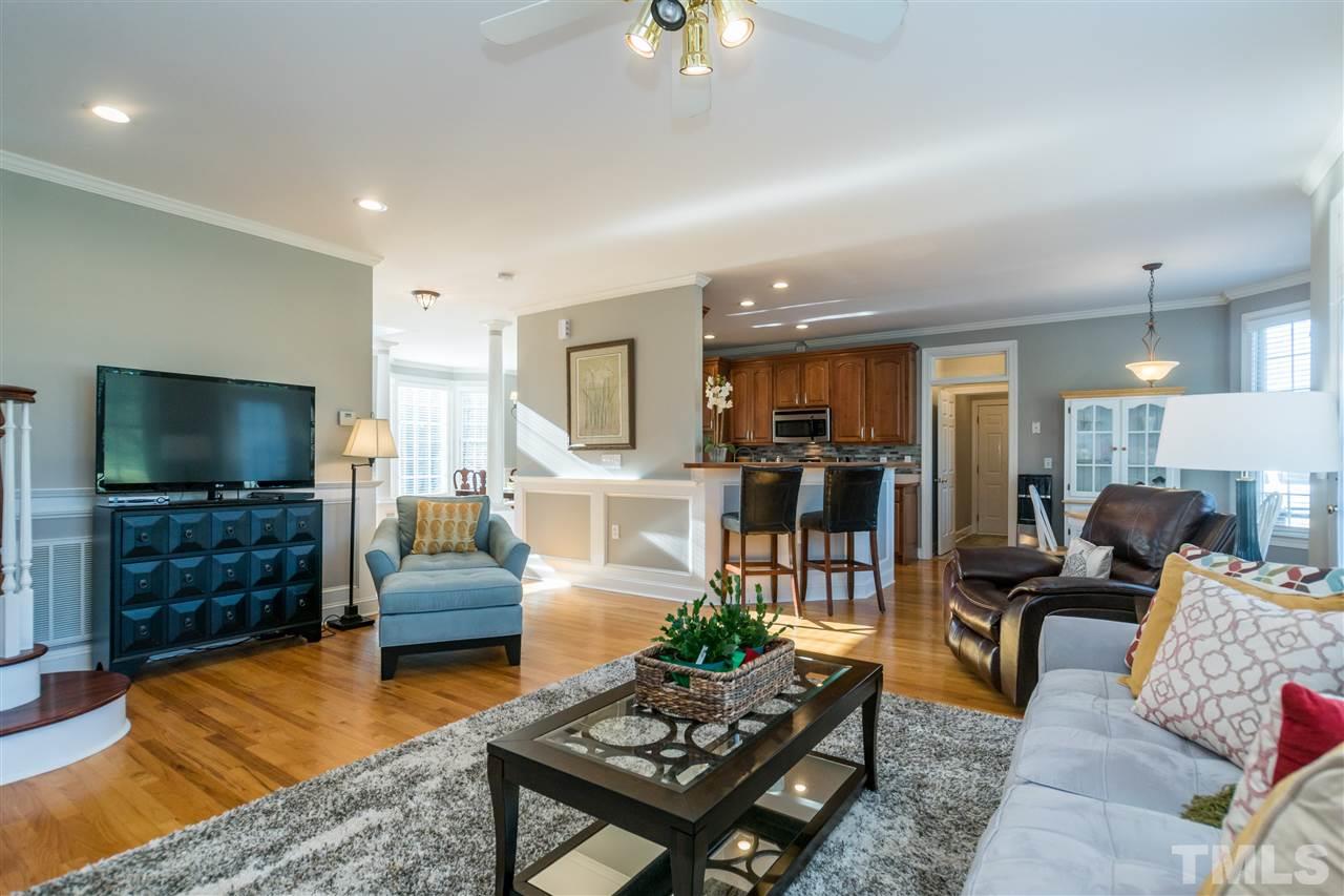 1000 Nortonbridge Road Raleigh, NC 27603 - Photo 9 of 30 a living room with furniture and a flat screen tv