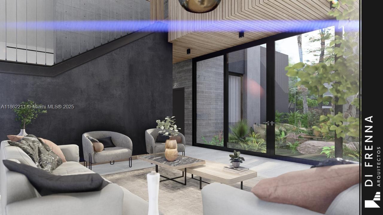 2664 Southwest 17th Avenue Miami, FL 33133 - Photo 12 of 56 a outdoor space with patio couches and a potted plant