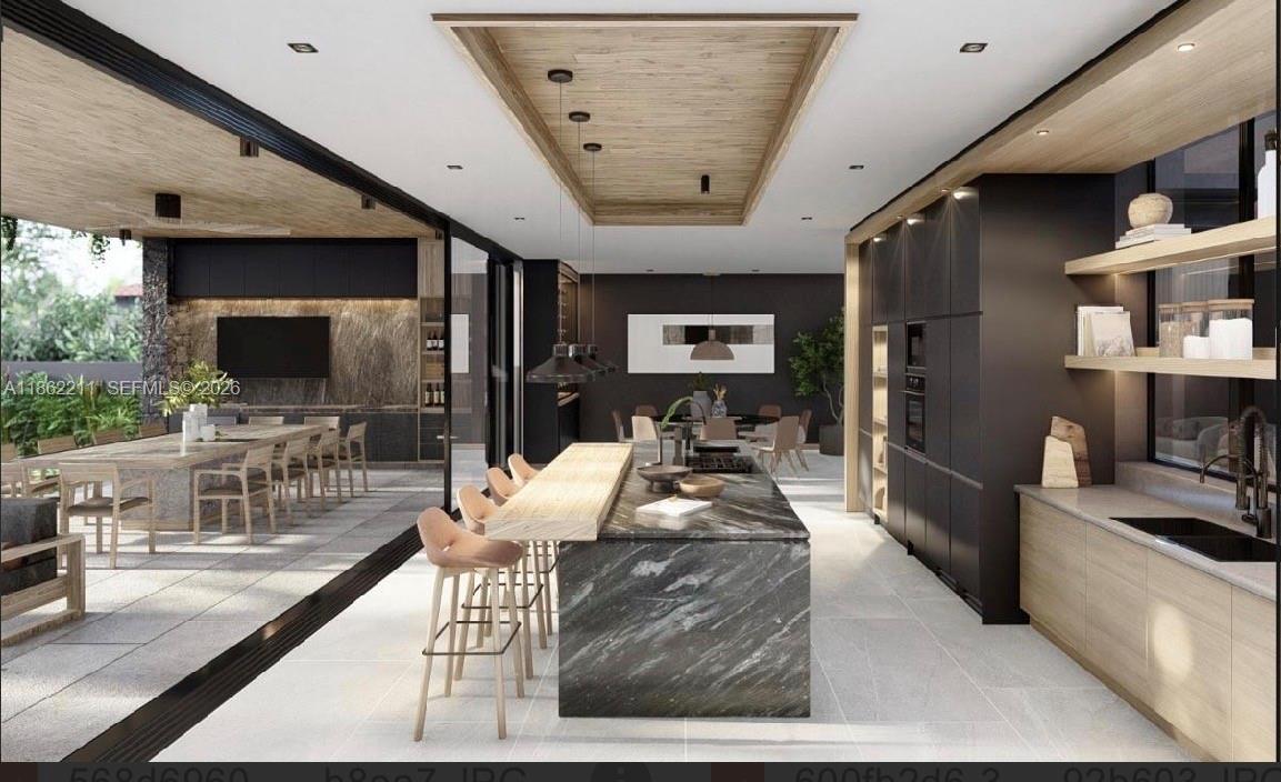 2664 Southwest 17th Avenue Miami, FL 33133 - Photo 13 of 32 a living room with furniture and a flat screen tv