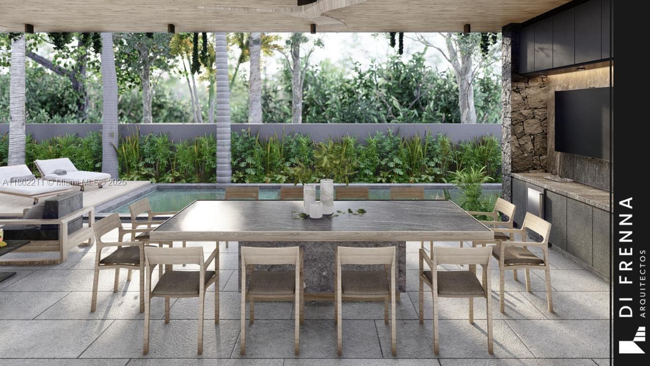 2664 Southwest 17th Avenue Miami, FL 33133 - Photo 25 of 56 a outdoor dining space with furniture and potted plants