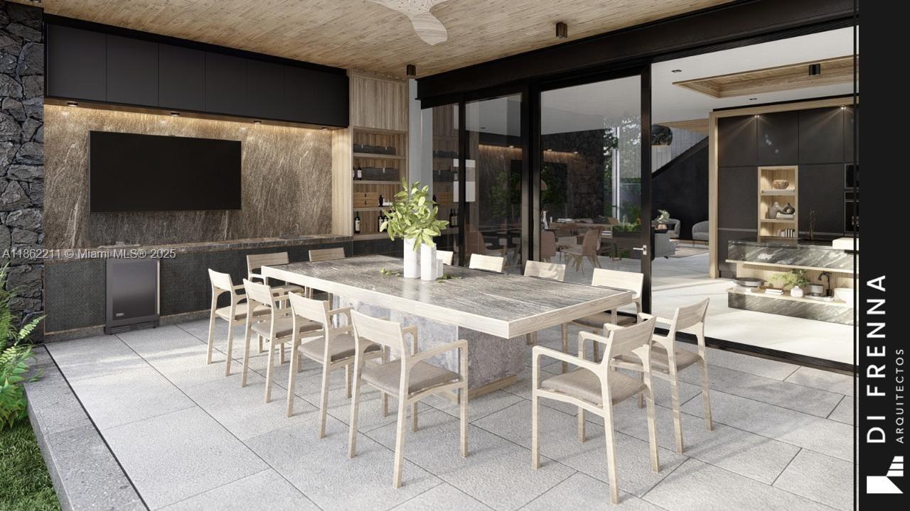 2664 Southwest 17th Avenue Miami, FL 33133 - Photo 26 of 56 a outdoor dining space with furniture