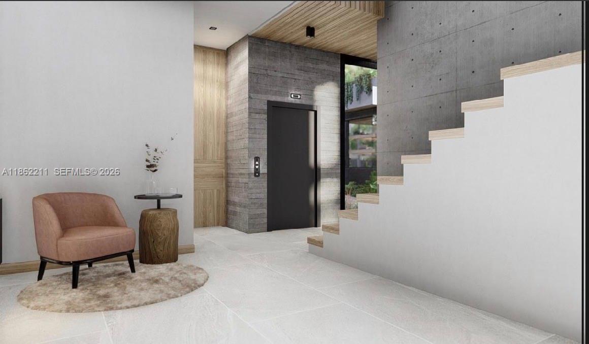 2664 Southwest 17th Avenue Miami, FL 33133 - Photo 3 of 32 a view of a livingroom with furniture and staircase