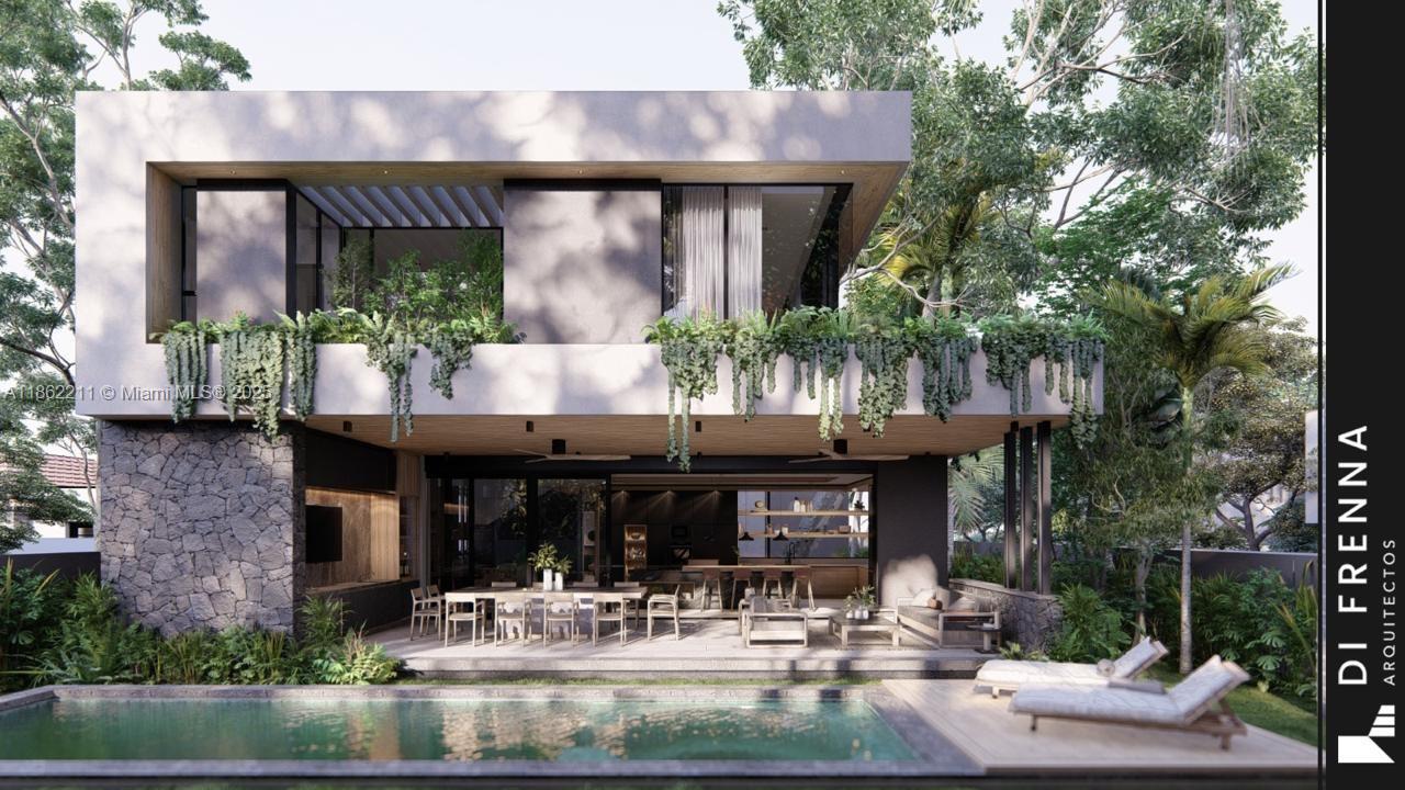 2664 Southwest 17th Avenue Miami, FL 33133 - Photo 32 of 56 a view of a building with sitting area and fountain in front of it