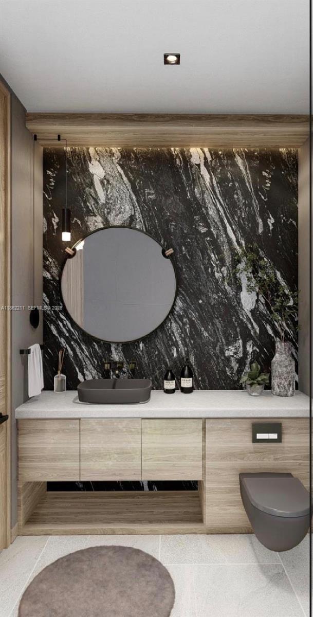 2664 Southwest 17th Avenue Miami, FL 33133 - Photo 4 of 32 a bathroom with a toilet and a sink