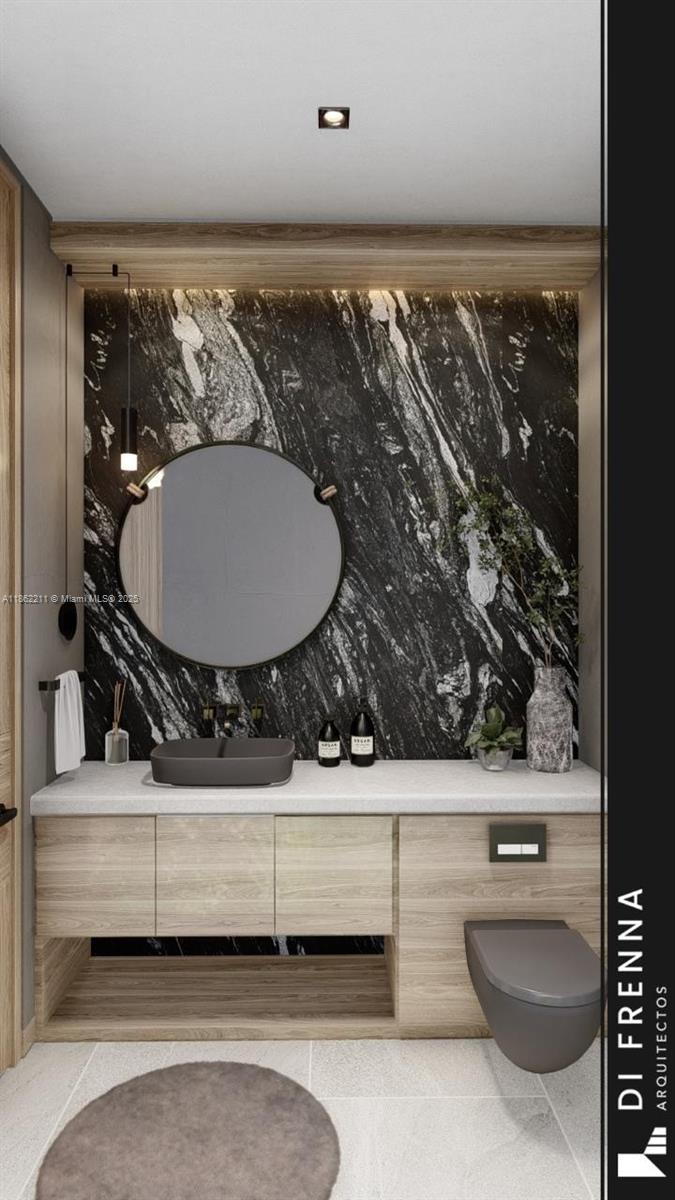 2664 Southwest 17th Avenue Miami, FL 33133 - Photo 9 of 56 a bathroom with a toilet