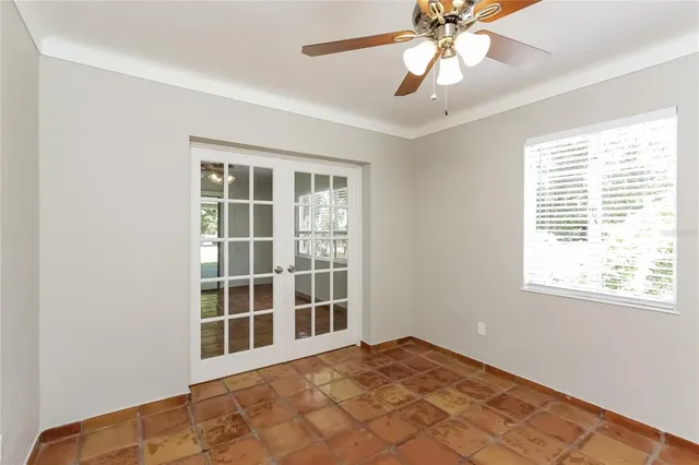 a view of an empty room with a window