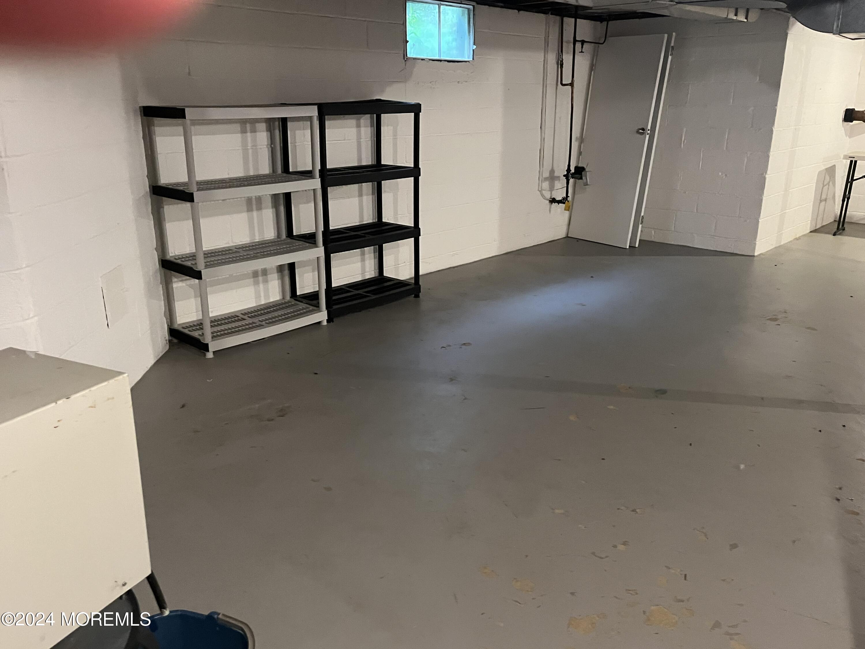 22 Robin Road Rumson, NJ 07760 - Photo 22 of 24 a view of room with window and closet