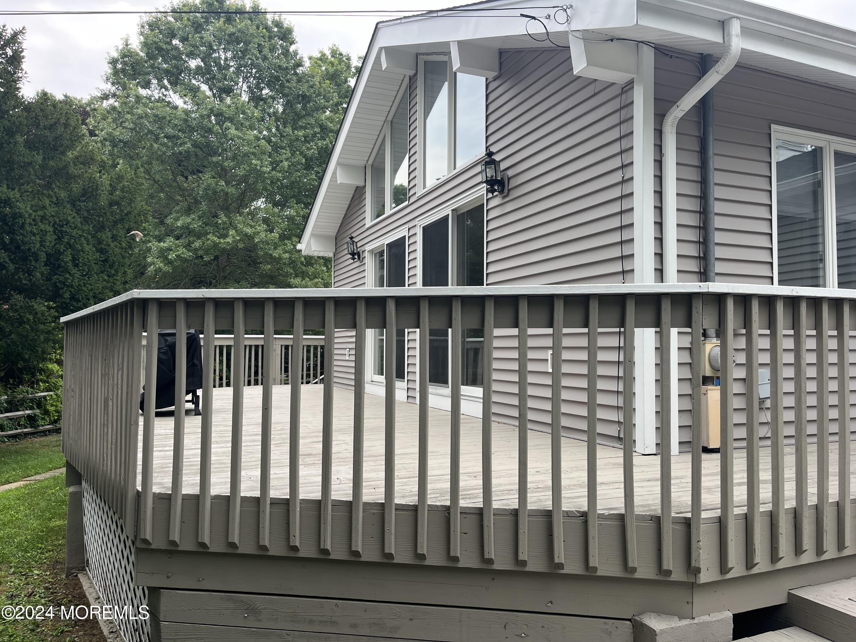 22 Robin Road Rumson, NJ 07760 - Photo 5 of 24 a view of a house with a deck