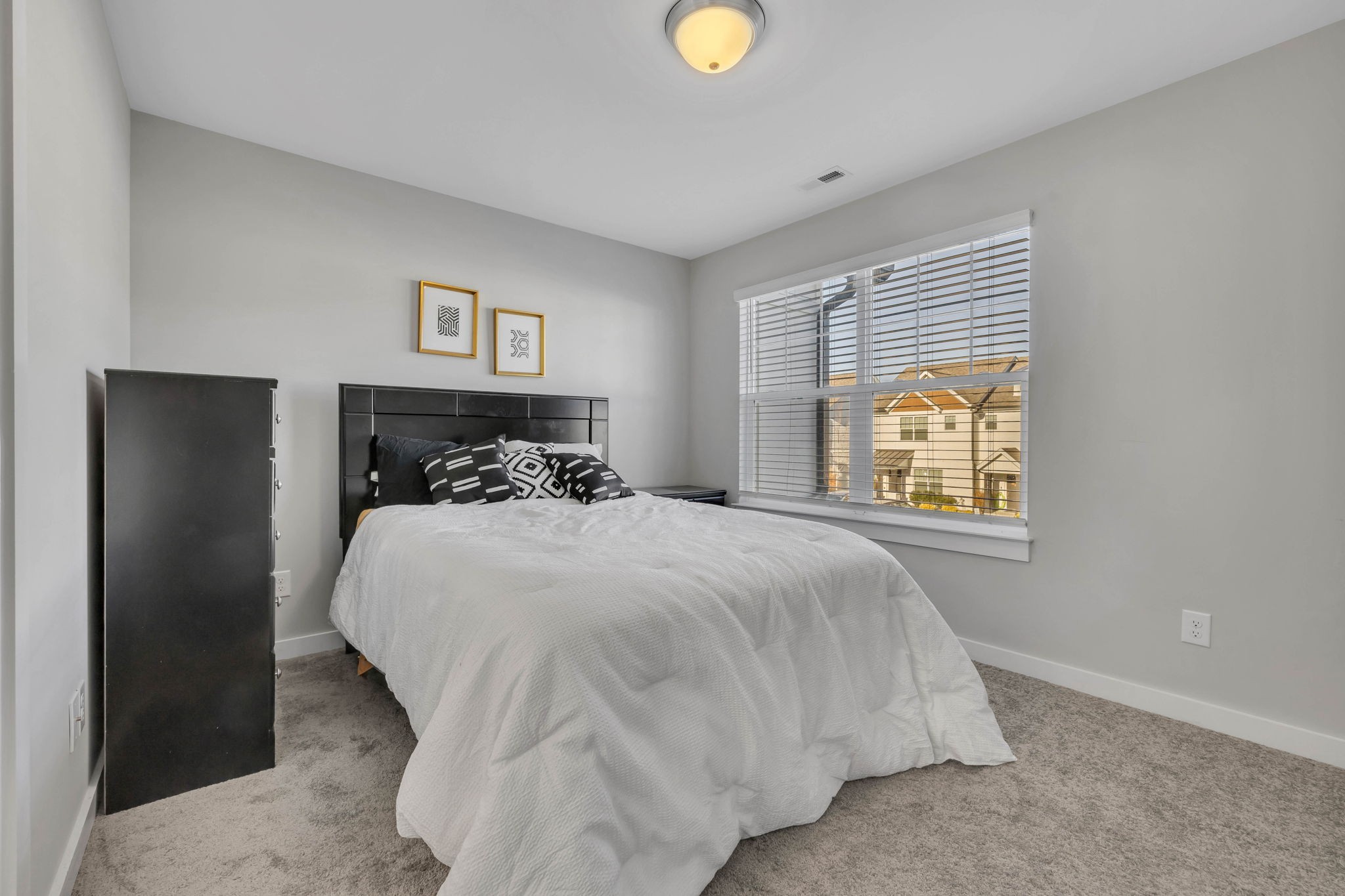 2344 Patrick Avenue Old Hickory, TN 37138 - Photo 17 of 20 a bedroom with a bed and a window