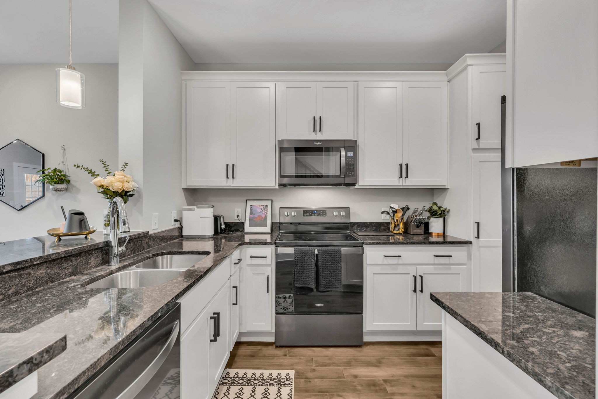2344 Patrick Avenue Old Hickory, TN 37138 - Photo 5 of 20 a kitchen with stainless steel appliances granite countertop a sink stove and refrigerator