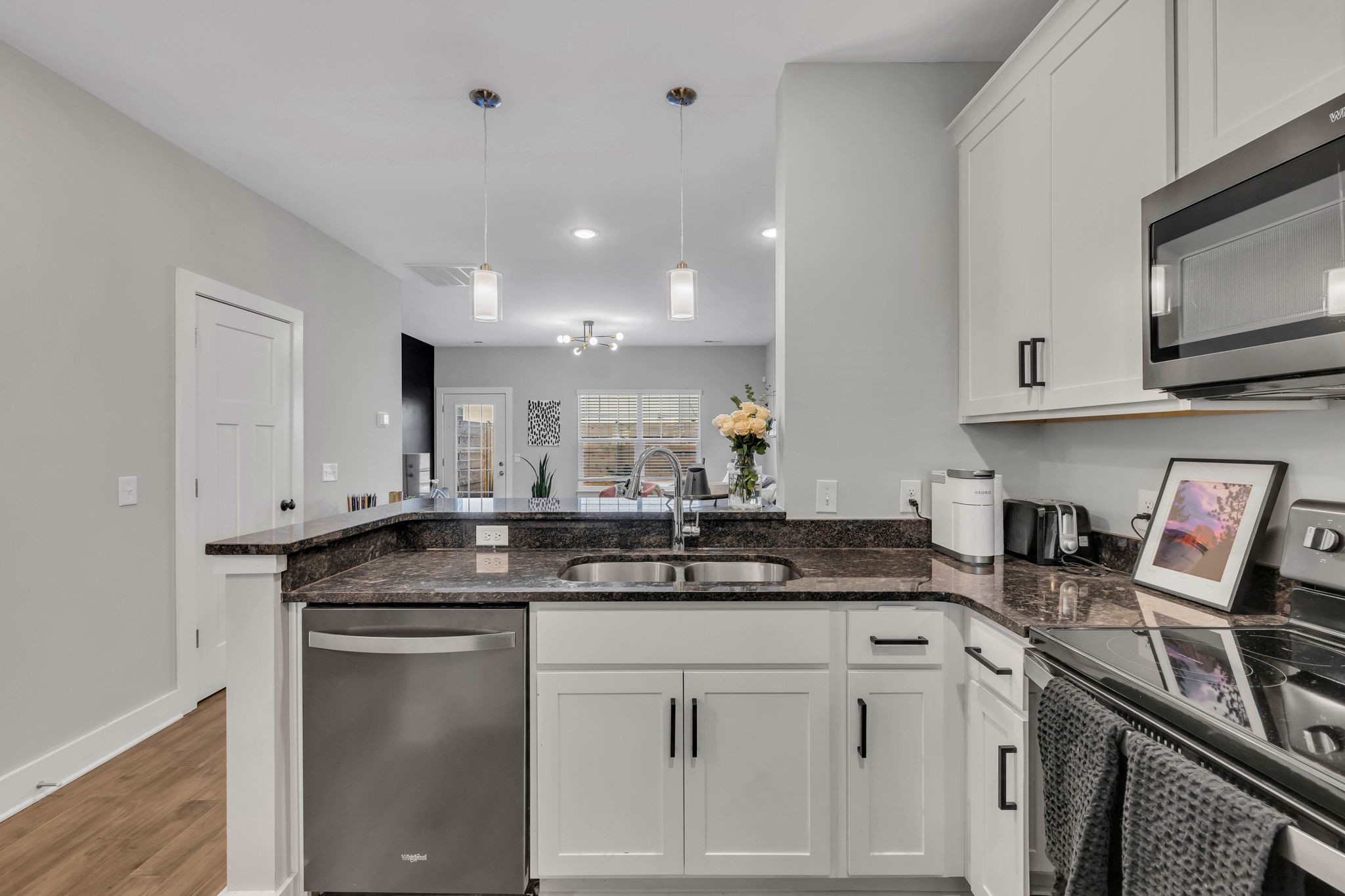 2344 Patrick Avenue Old Hickory, TN 37138 - Photo 7 of 20 a kitchen with stainless steel appliances granite countertop a sink stove and cabinets