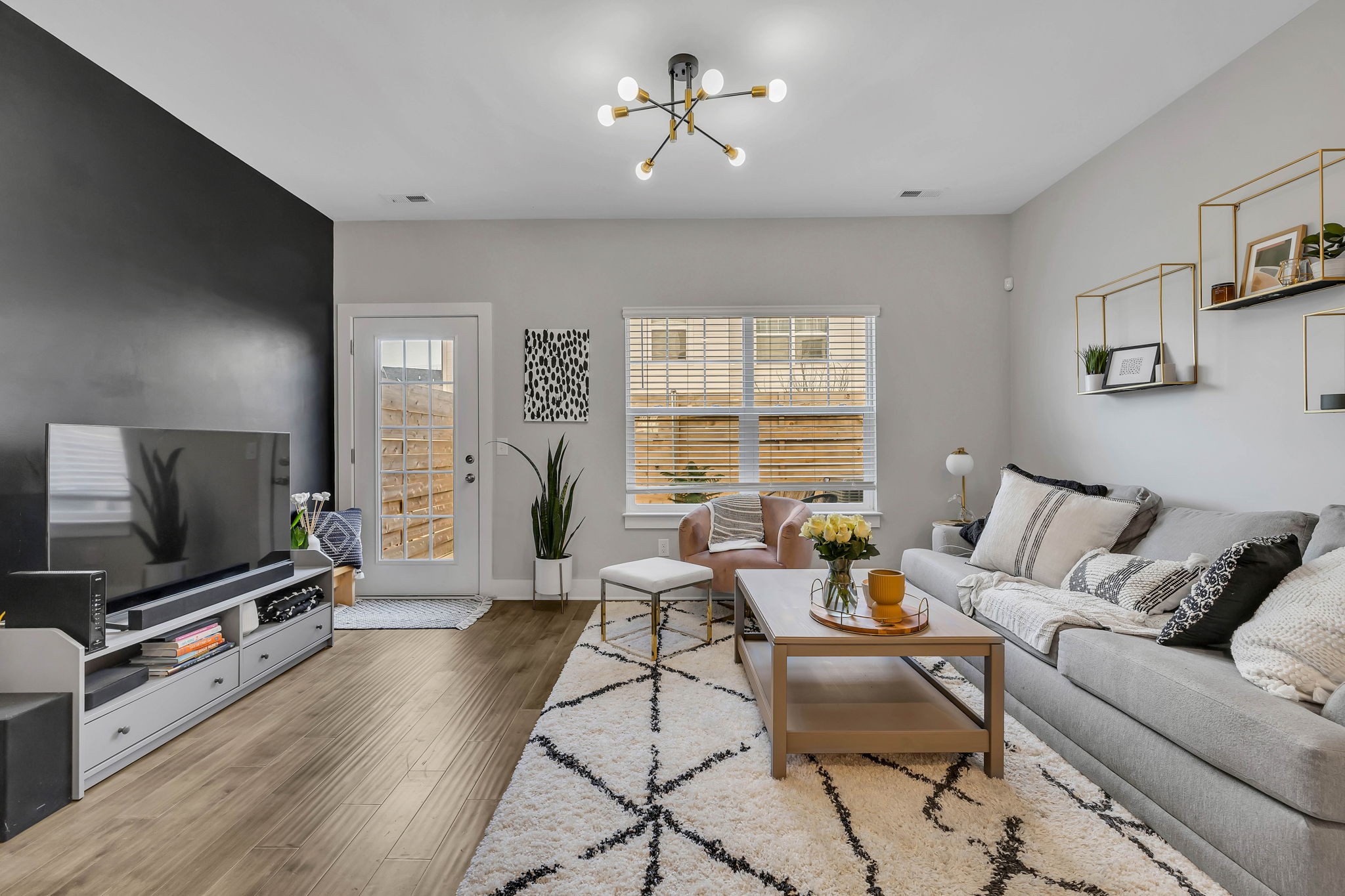 2344 Patrick Avenue Old Hickory, TN 37138 - Photo 10 of 20 a living room with furniture and a flat screen tv