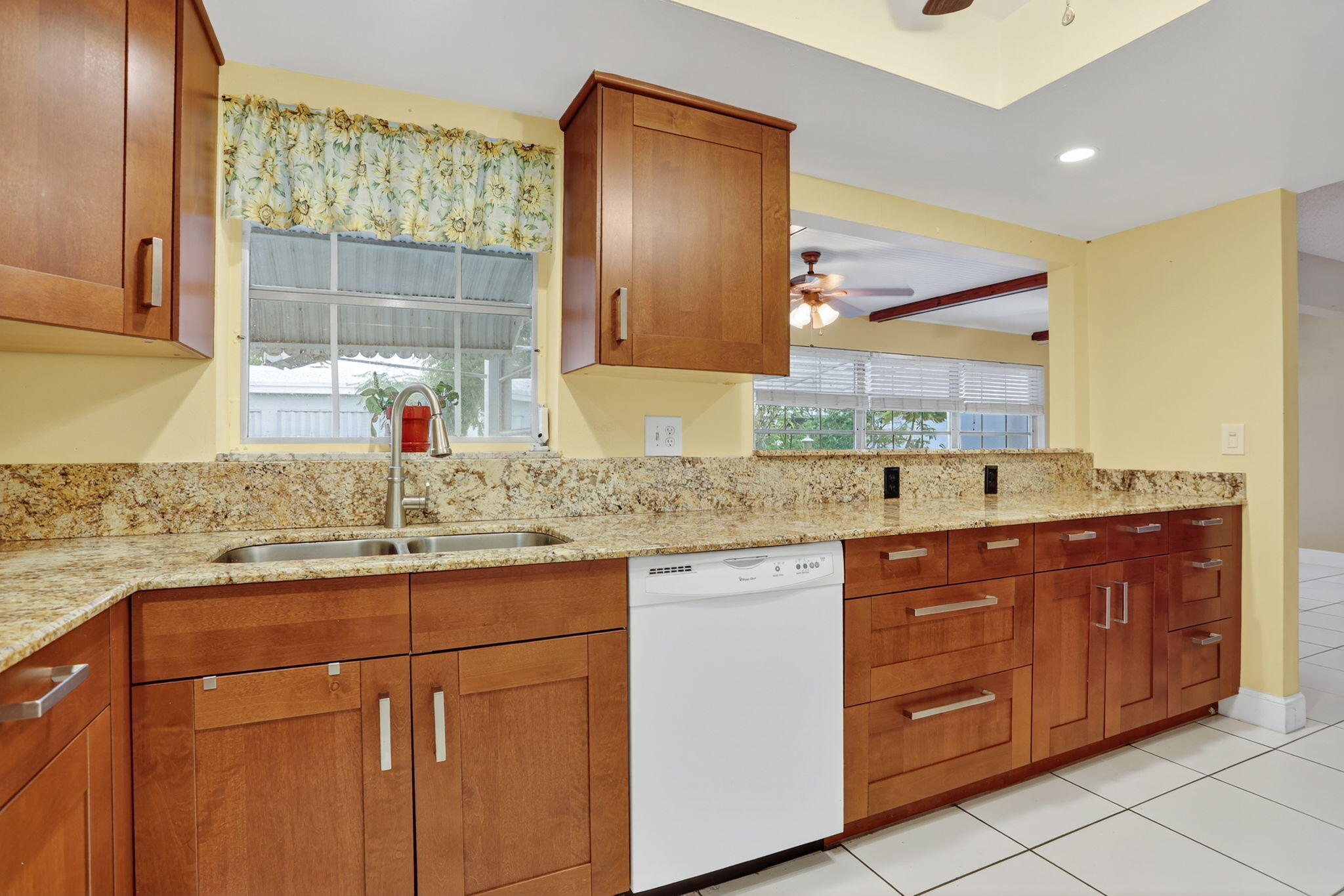 161 Northwest 24th Court Pompano Beach, FL 33064 - Photo 12 of 45 a bathroom with a granite countertop sink and a mirror