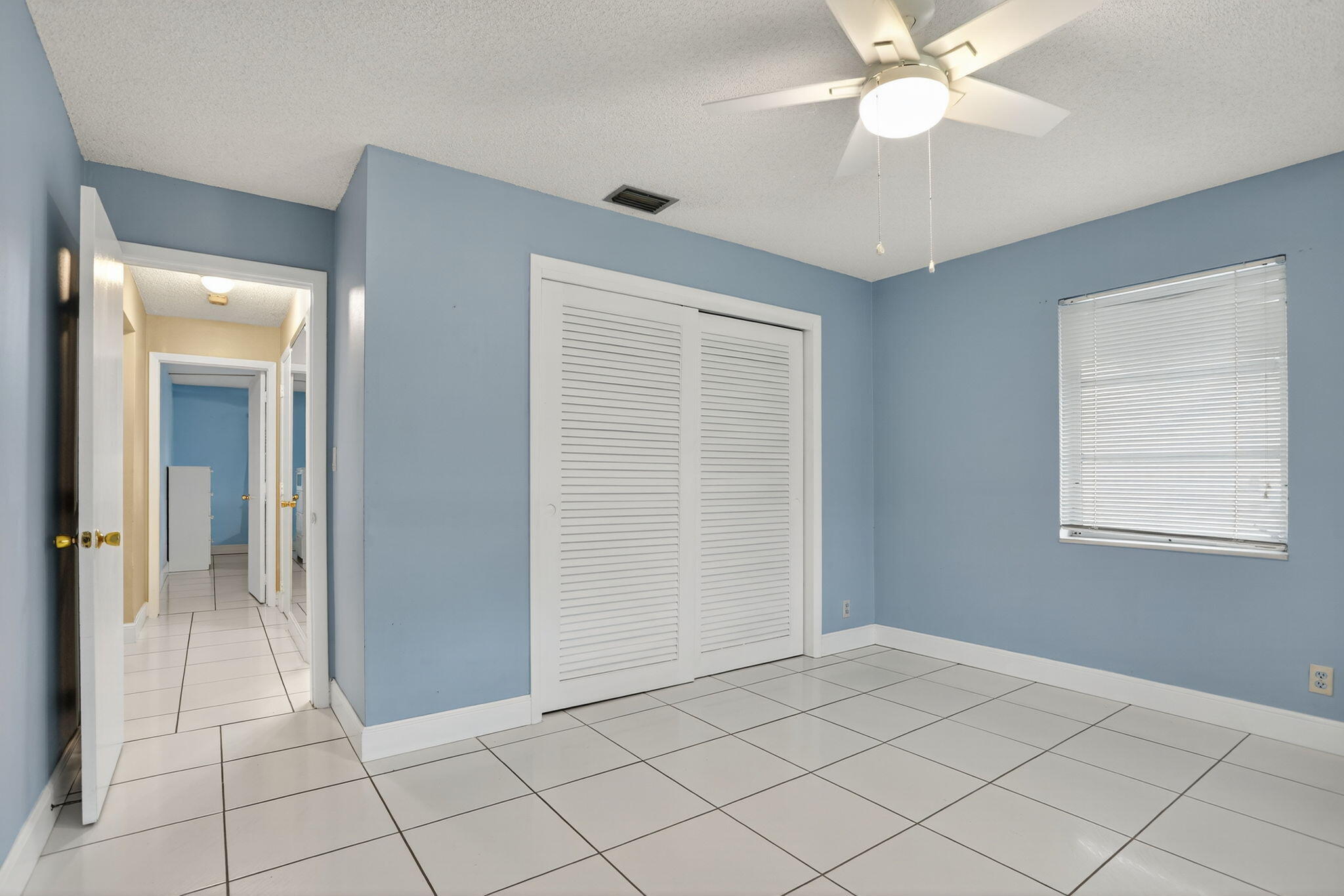 161 Northwest 24th Court Pompano Beach, FL 33064 - Photo 19 of 45 a view of an empty room and window
