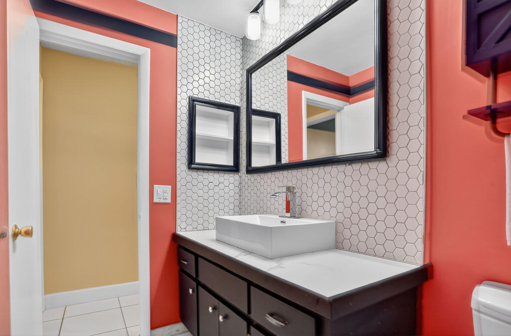 161 Northwest 24th Court Pompano Beach, FL 33064 - Photo 21 of 45 a bathroom with a sink and a mirror