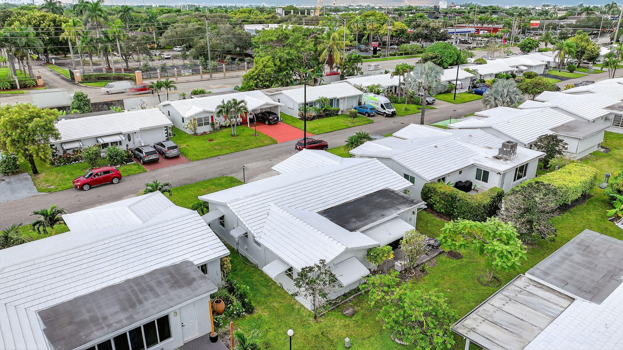 161 Northwest 24th Court Pompano Beach, FL 33064 - Photo 27 of 45 an aerial view of a house with swimming pool yard and outdoor seating
