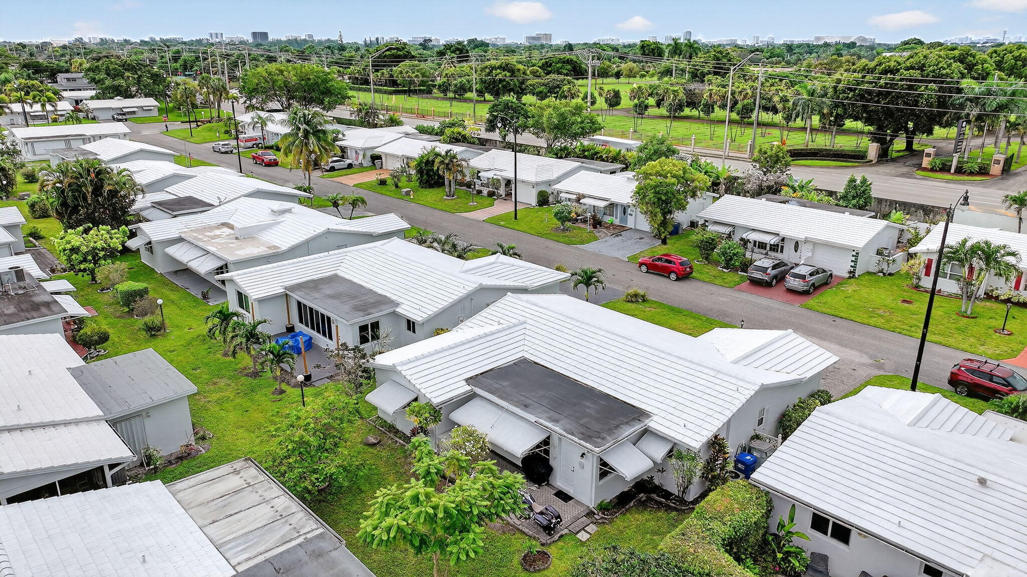 161 Northwest 24th Court Pompano Beach, FL 33064 - Photo 28 of 45 an aerial view of a house with a garden